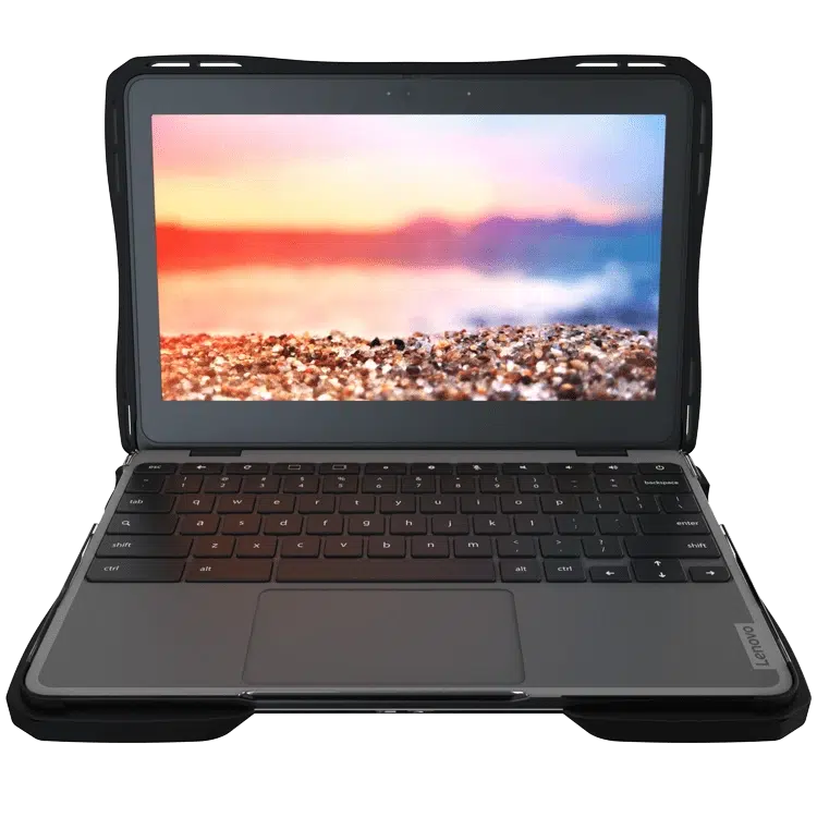 Compact laptop with dark keyboard, open to a screen showing a colorful sunset over a rocky shore.