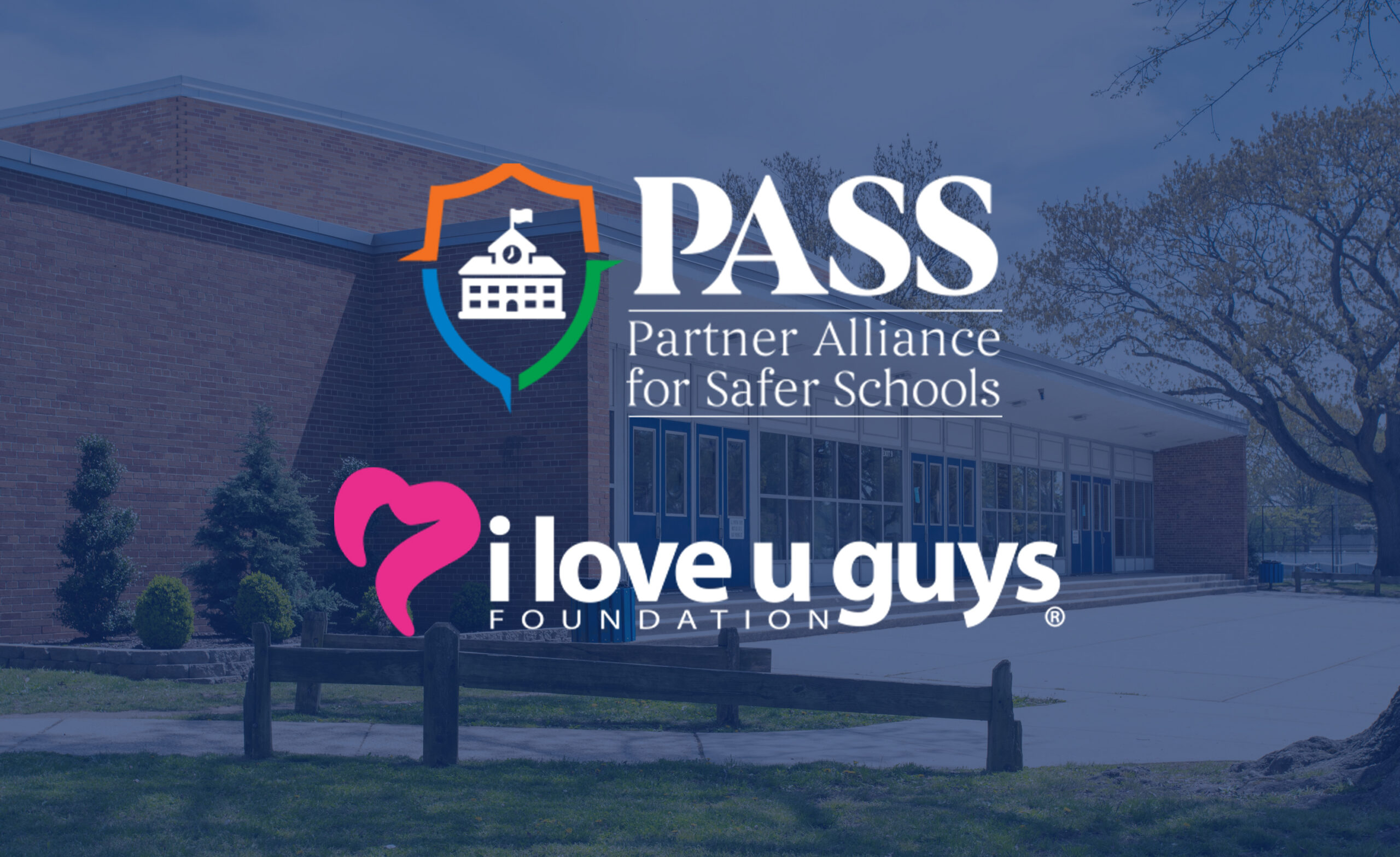 Banner image showing school safety logos on a brick school exterior (pass and i love u guys foundation).